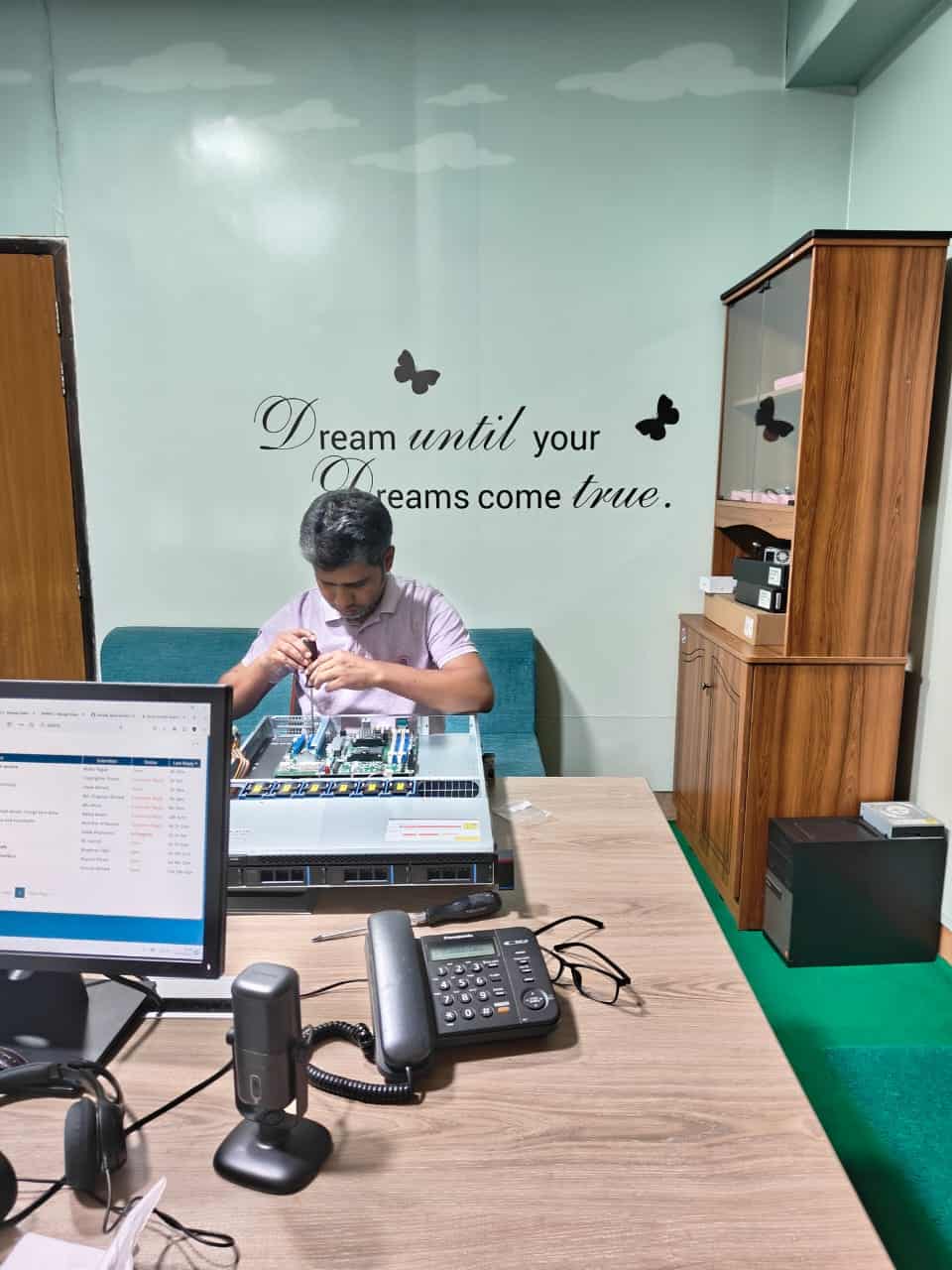 Saleh Ahmed at their office